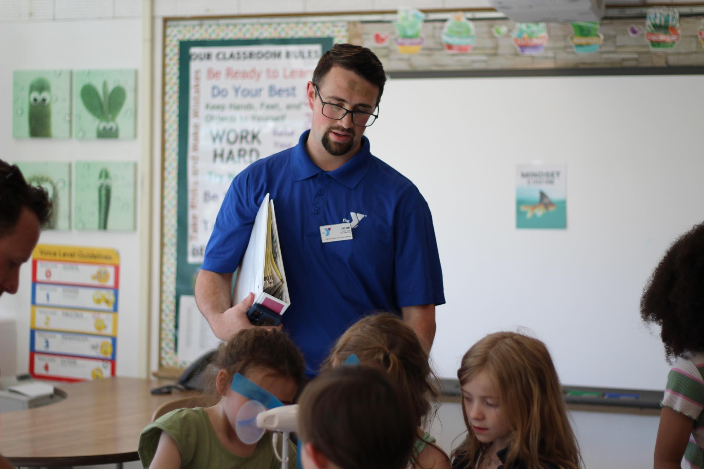  Jacob Brask site director supervising Y Kids at Tillicum STEAM Night. 