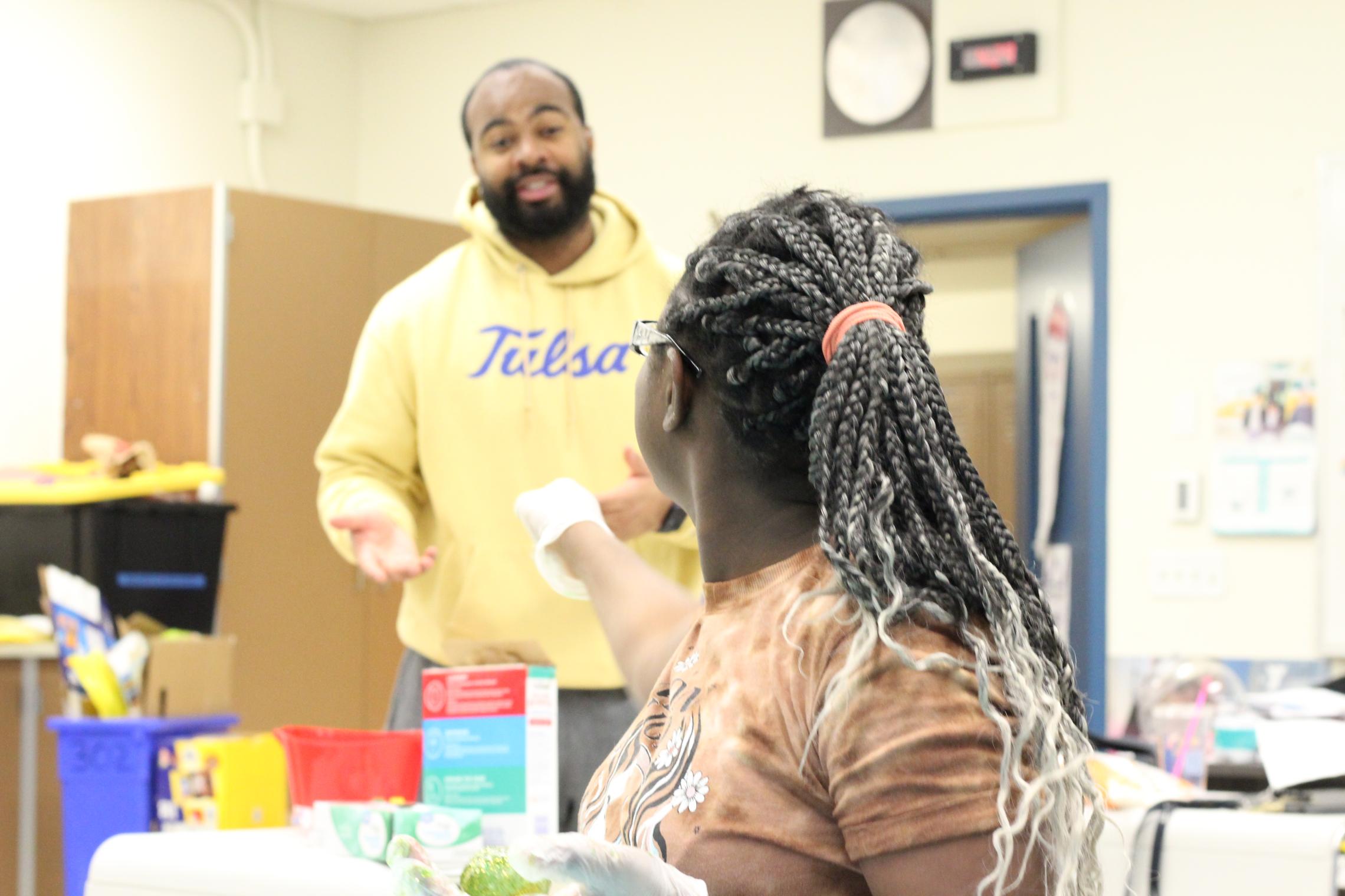 Dionte Simon Talking with Lochburn Student 