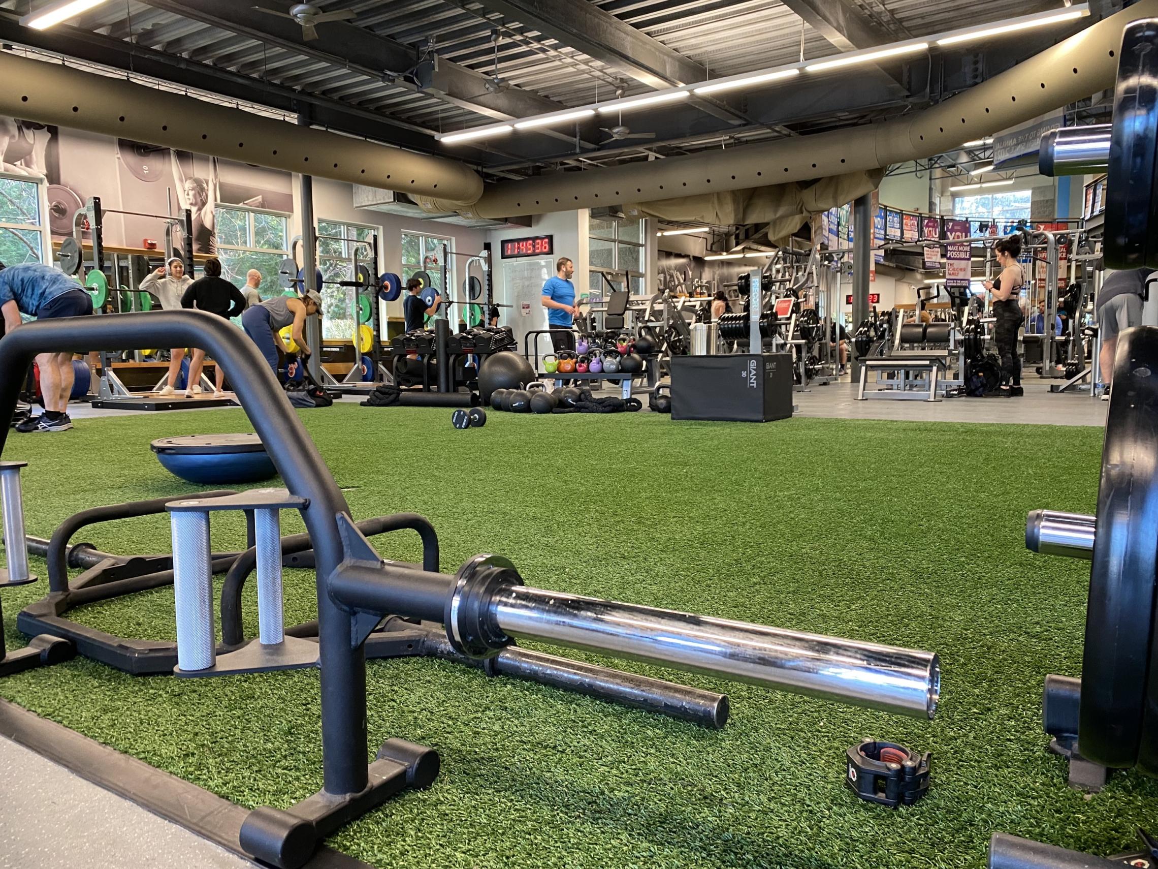 Photo of members enjoying the gym enhancements at the Tom Taylor Family YMCA