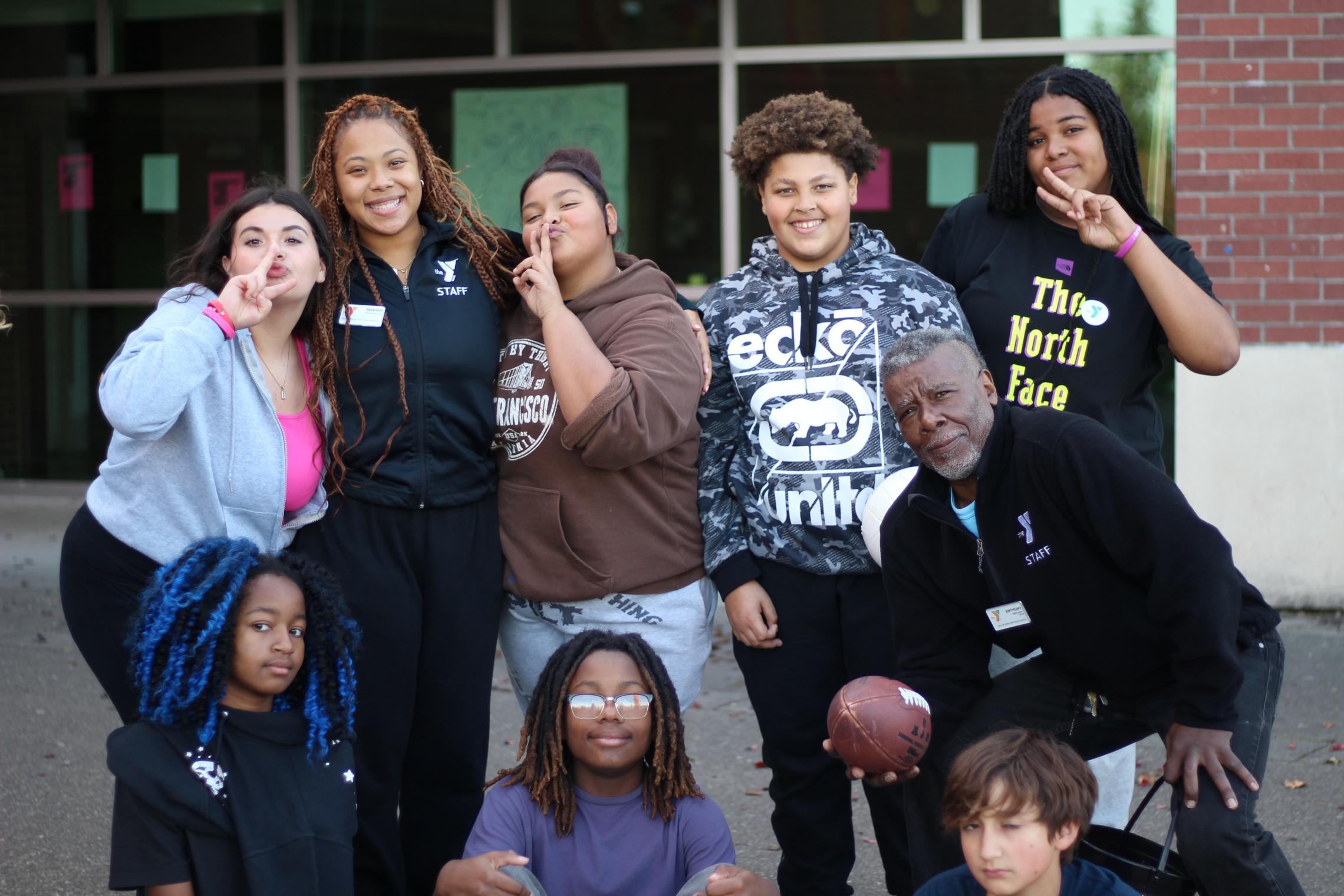 Center for Community Impact students gather for a photo at the YMCA