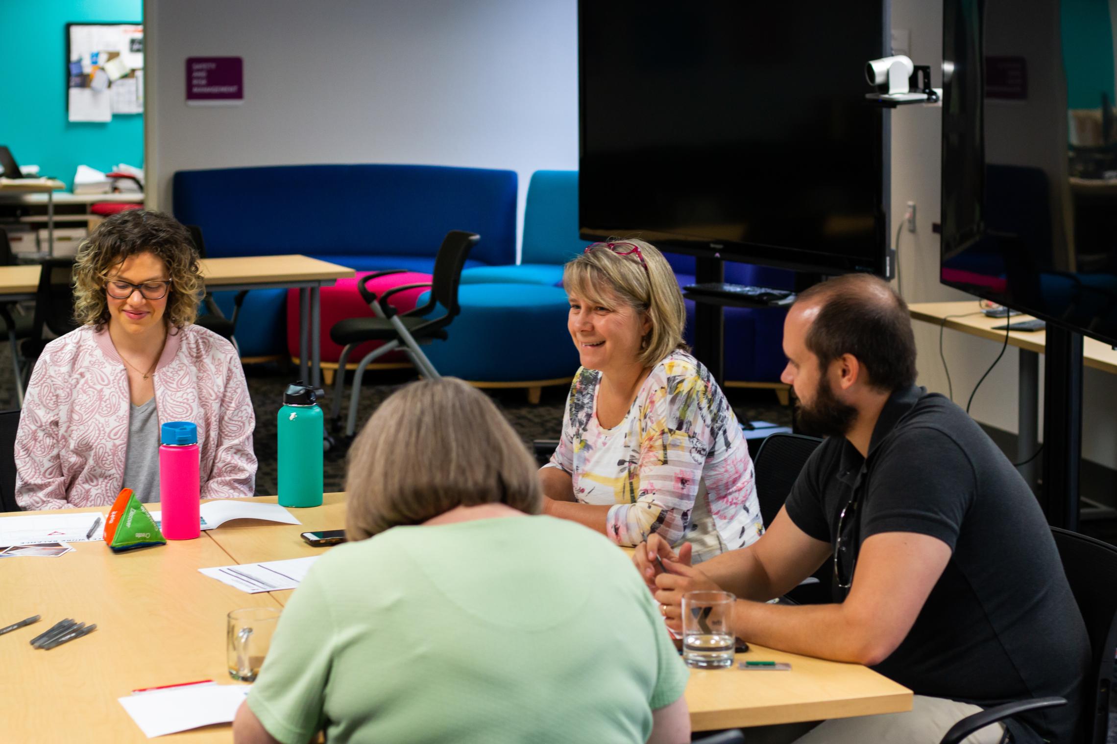 Bridge of Hope members engage in meaningful conversation at the YMCA