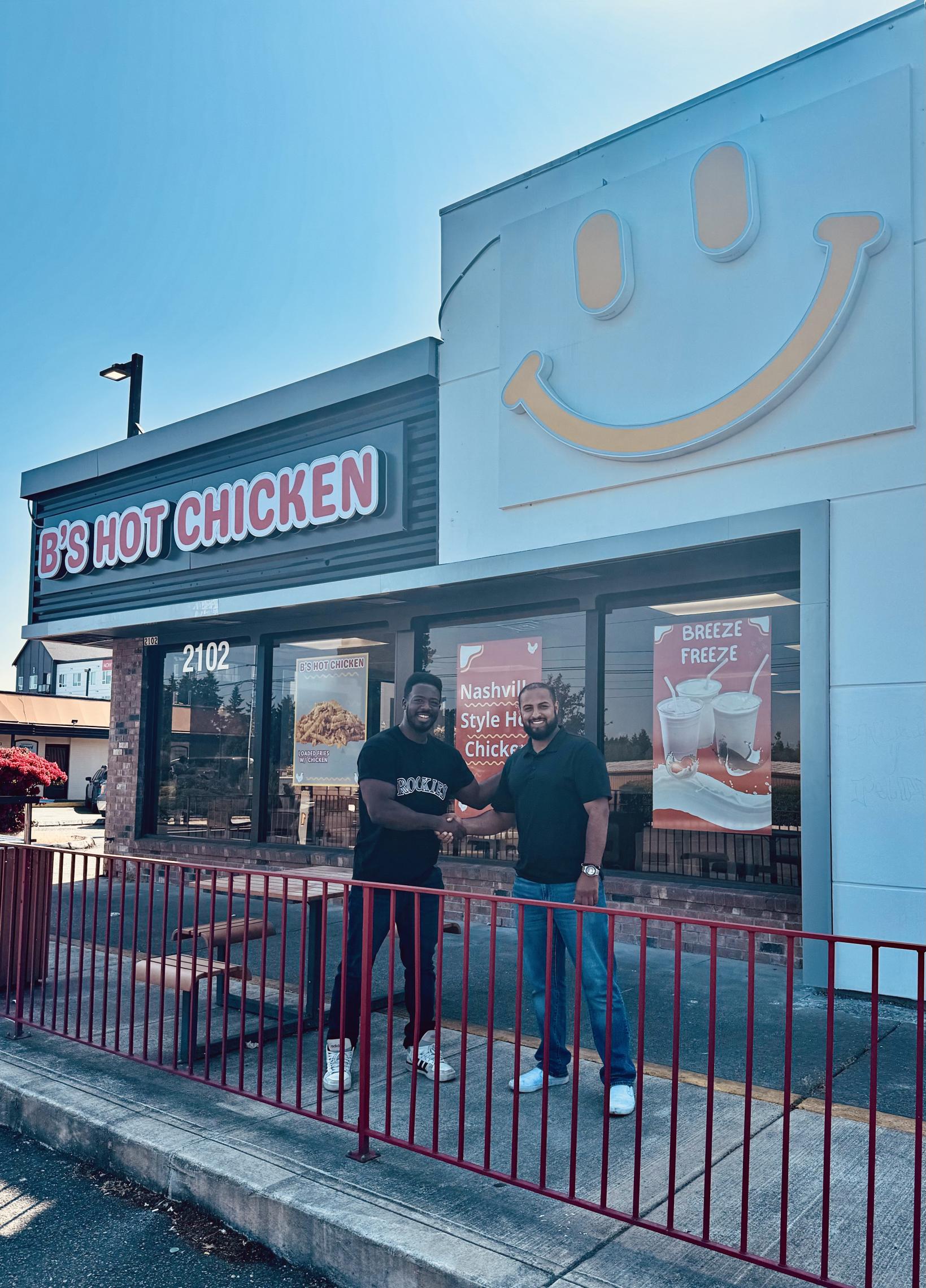 Kwabi in front of B's Hot Chicken