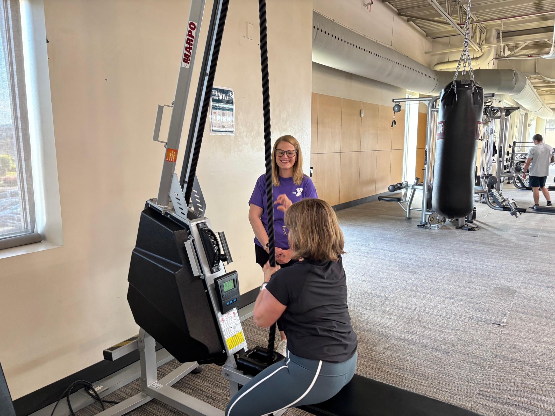 Jaclyn on the rope pull machine