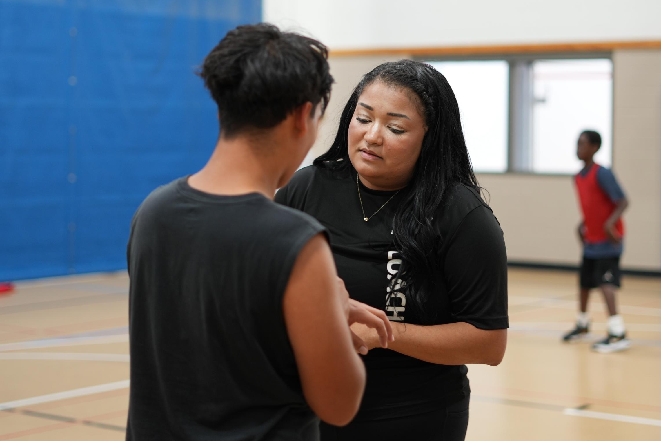 Coach Ali and a player