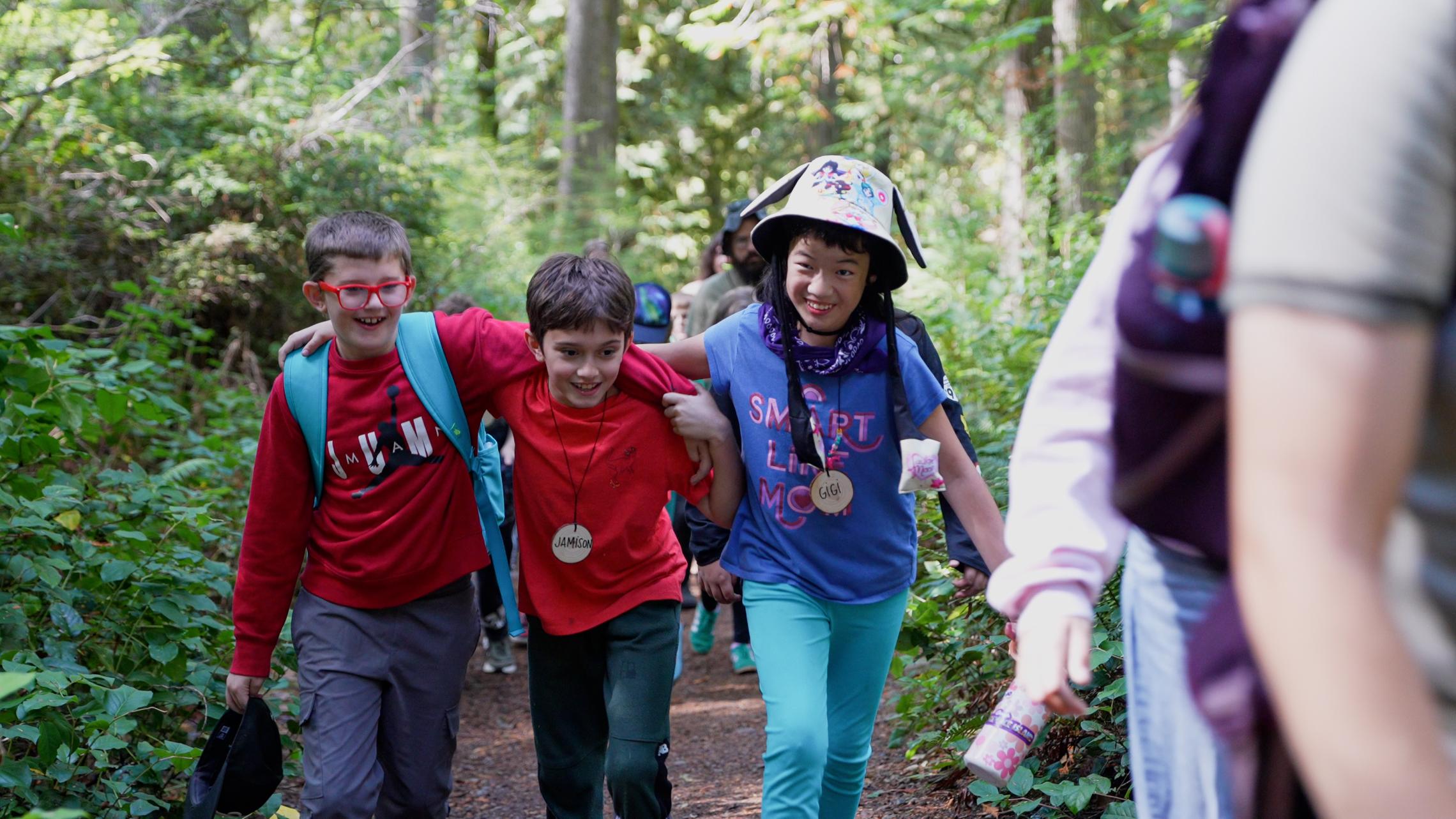 Three OEE Students in the forest