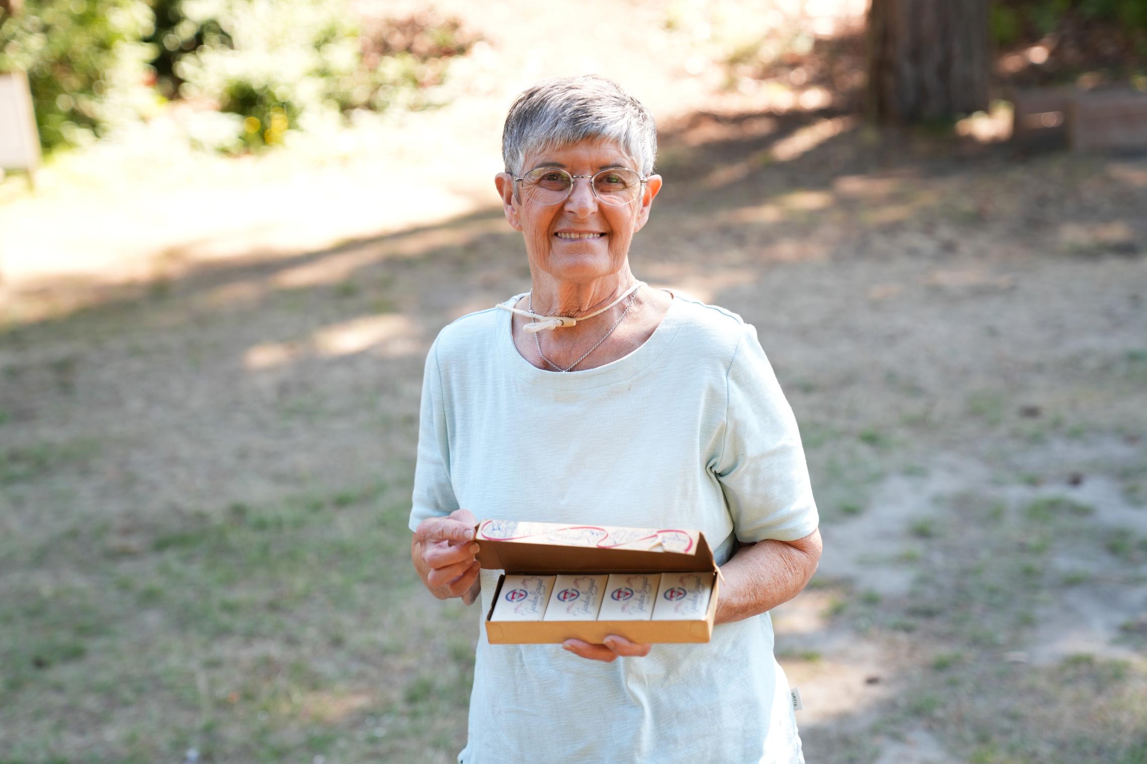 Irene holding a box of soap