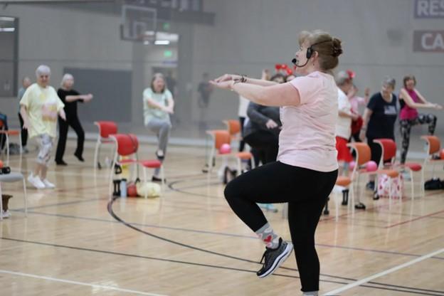 Stefani leading a group exercise class