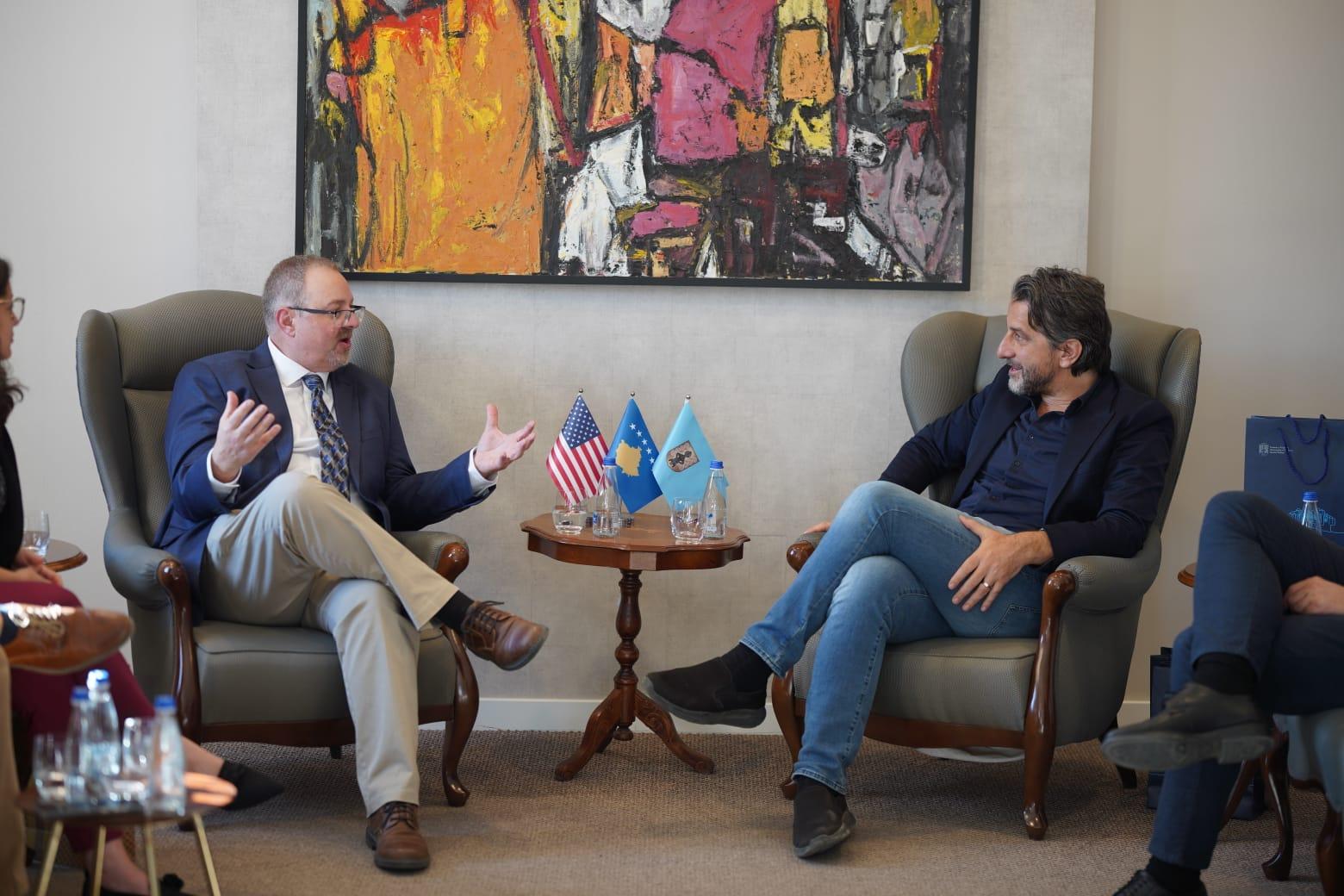 Camp Seymour Executive Director Scotty Jackson meets with YMCA Kosovo leadership during a partnership visit, discussing youth development, camp programs, and international YMCA collaboration.