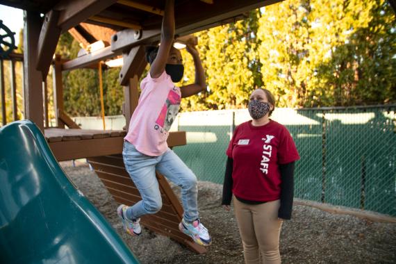 Playing on Monkey Bars at YMCA Early Learning Center