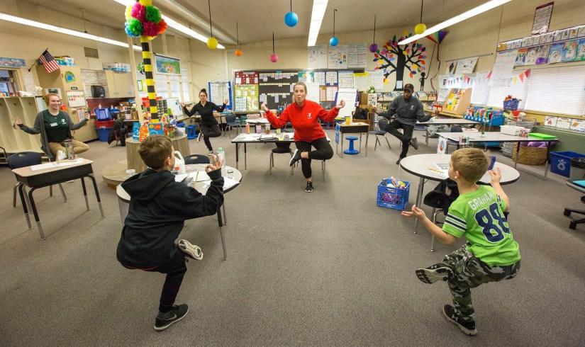 Kids doing yoga at Child Care