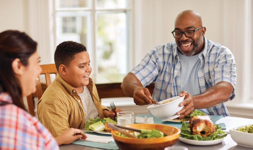 YMCA Healthy Living Eating Salad With Family