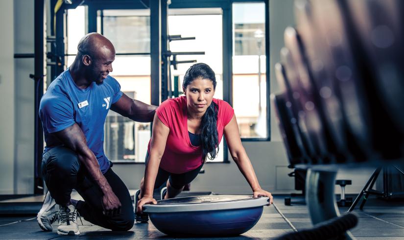 Training With A Bosu Ball At a YMCA Weight Training Class