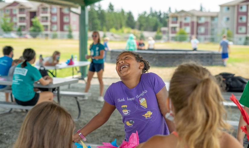 YMCA Summer Day Camps Where Girls Are Having Fun At Table