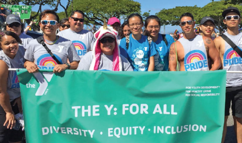 A group of YMCA members and staff celebrates Pride in Pierce County