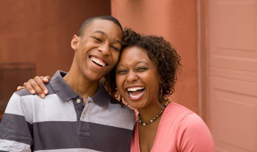 Mother and Son Laughing At YMCA Community Center