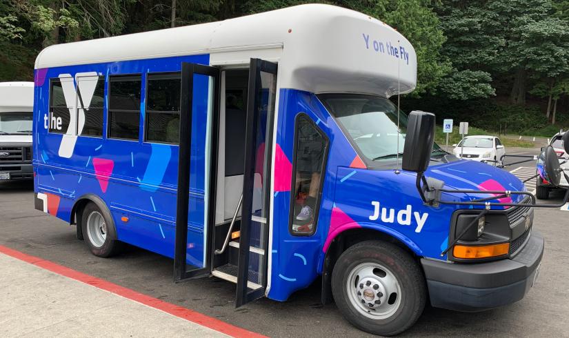 A bus with the name Judy on the side is parked in Tacoma, Washington.