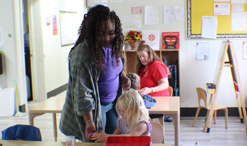 Day Harvey and YMCA staff leading a lesson plan 