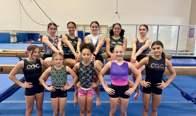 Gymnastics team poses for a team photo at the YMCA
