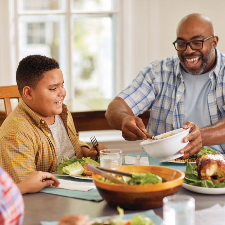 YMCA Healthy Living Eating Salad With Family