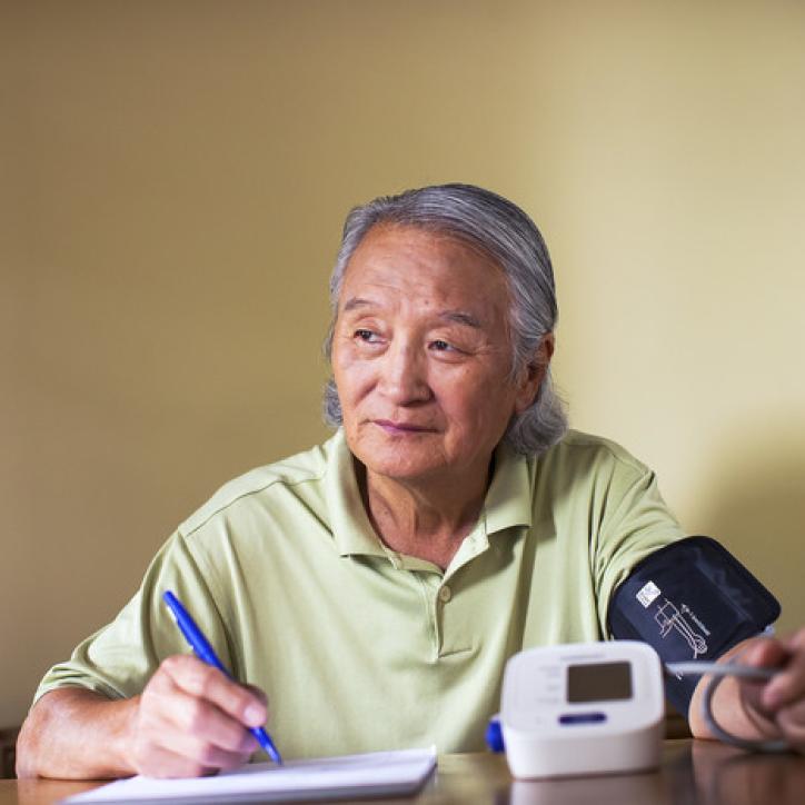 Active older adult self-monitoring their blood pressure