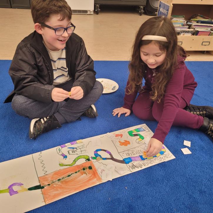 Creating their board games at winter camp! 