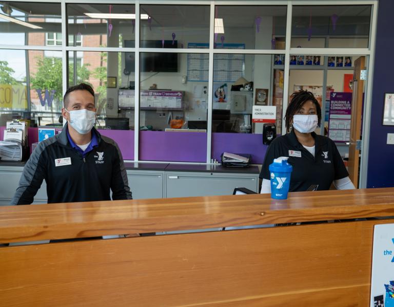 Staff Welcoming In Members Of The YMCA