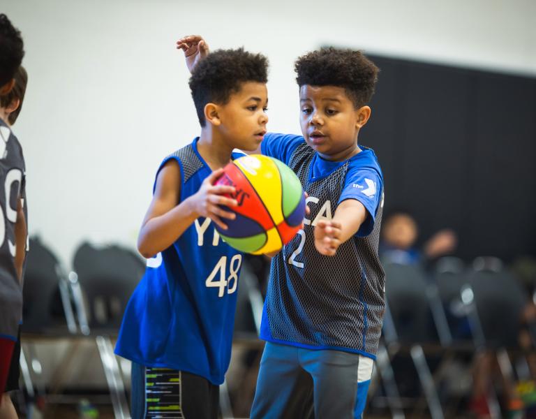 Dribbling Down the Court at YMCA Youth Basketball League