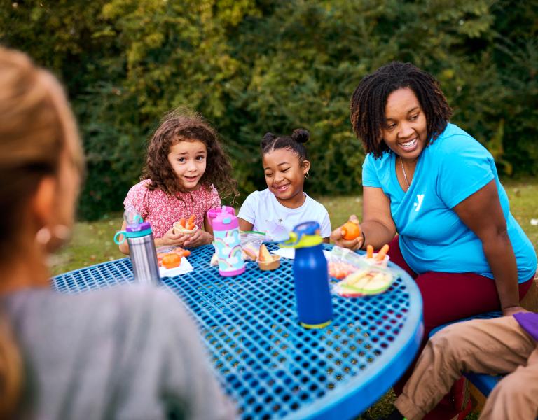 Eating Around the Table at YMCA Child Care Summer Day Camp
