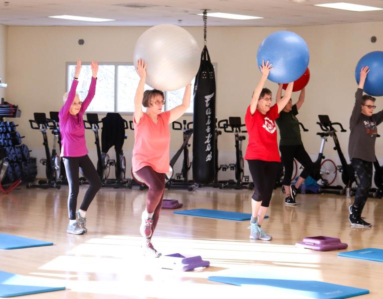 Exercise ball aerobics class in session.