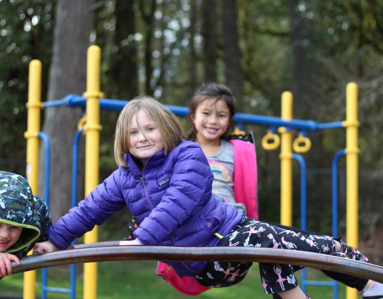 Hanging Out on Jungle Gym at Local YMCA School Camps