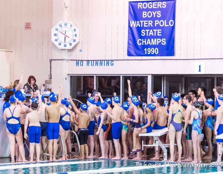 Photo of the Mel Korum Seals rallying together before a swim meet at the YMCA