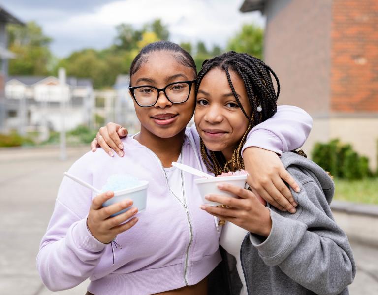 Late Nite Teens pose with snow cones at the YMCA