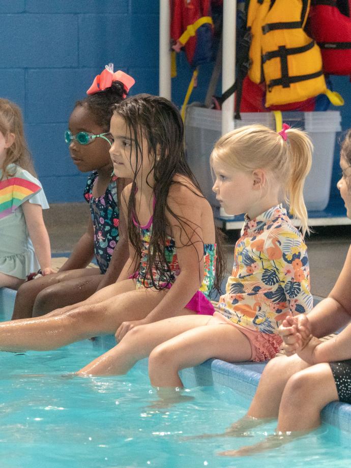 YMCA Swim Lessons Students Listening To Instructor