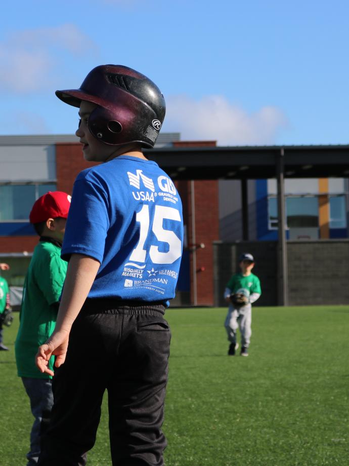 Shot of youth baseball player on base