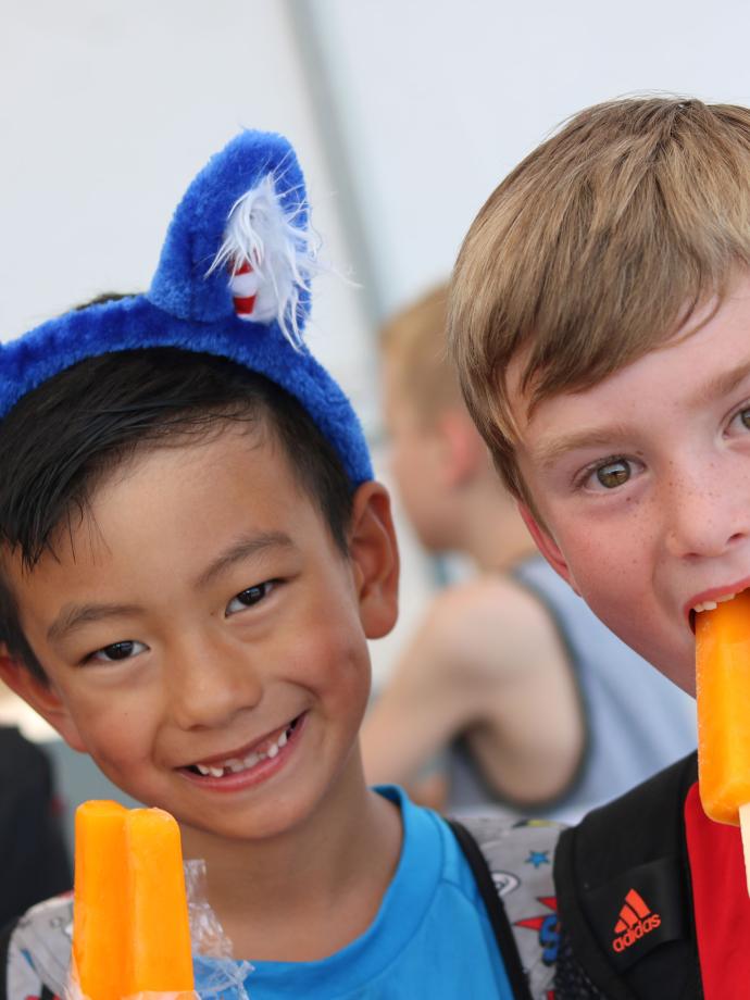 Friends Eating Popsicles at YMCA Healthy Kids Day
