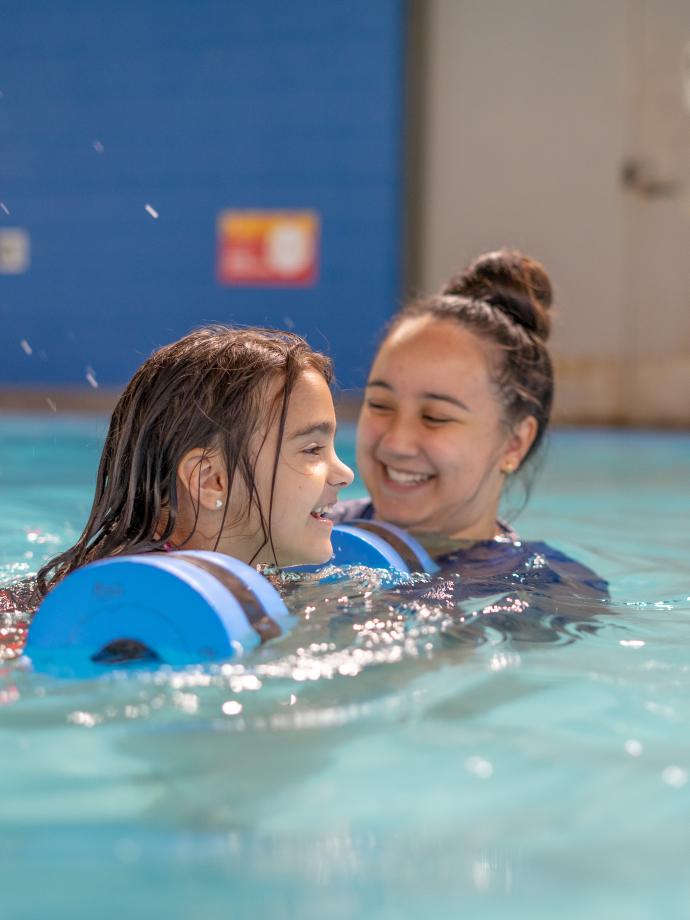 Swim lesson with floatie bar