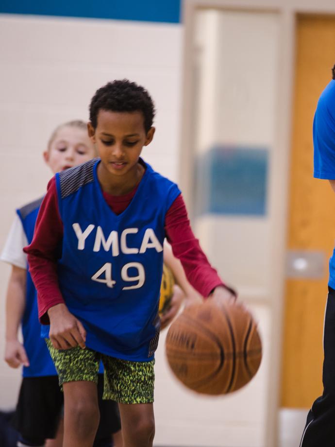 Basketball skills student practicing dribble form