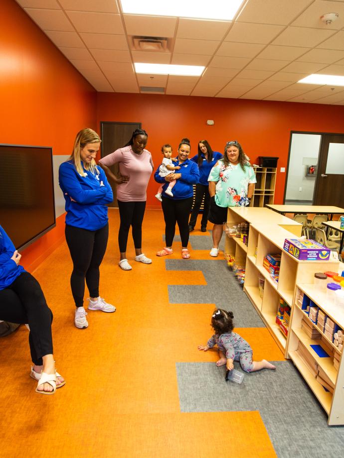 Child care center filled with staff and infants