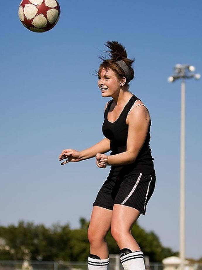 Soccer player heading the ball at the YMCA