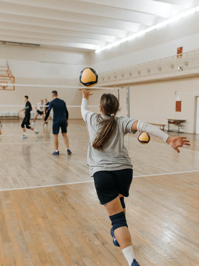 Volleyball player sets up for a serve at the YMCA