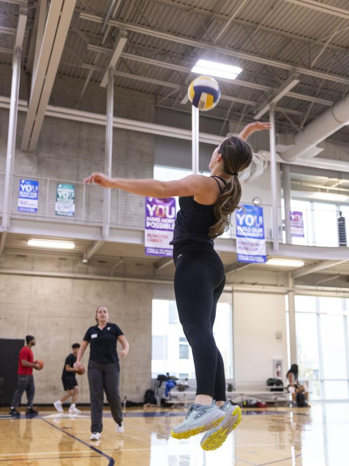 Action shot of a jump volley ball serve at the YMCA