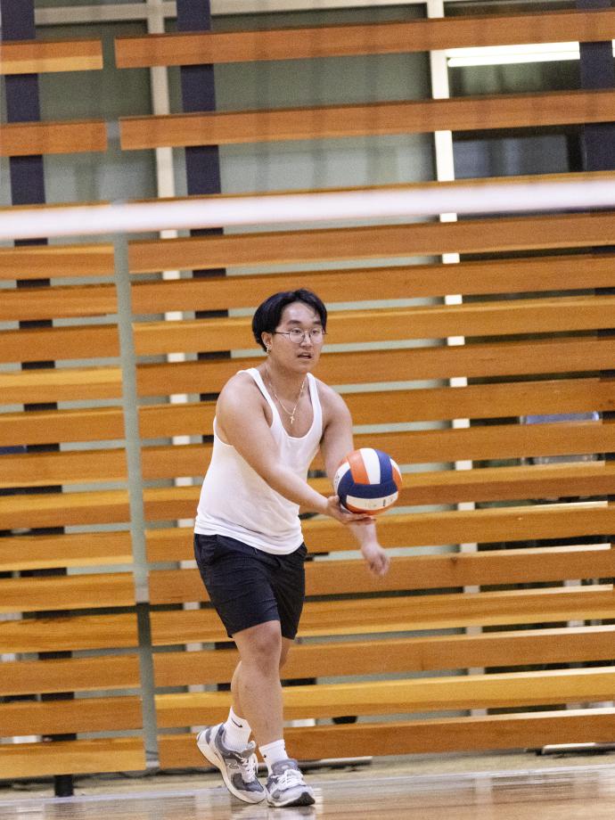 Server gets ready to set themselves up during volleyball at the YMCA