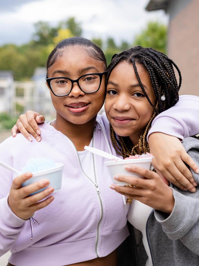 Late Nite Teens pose with snow cones at the YMCA