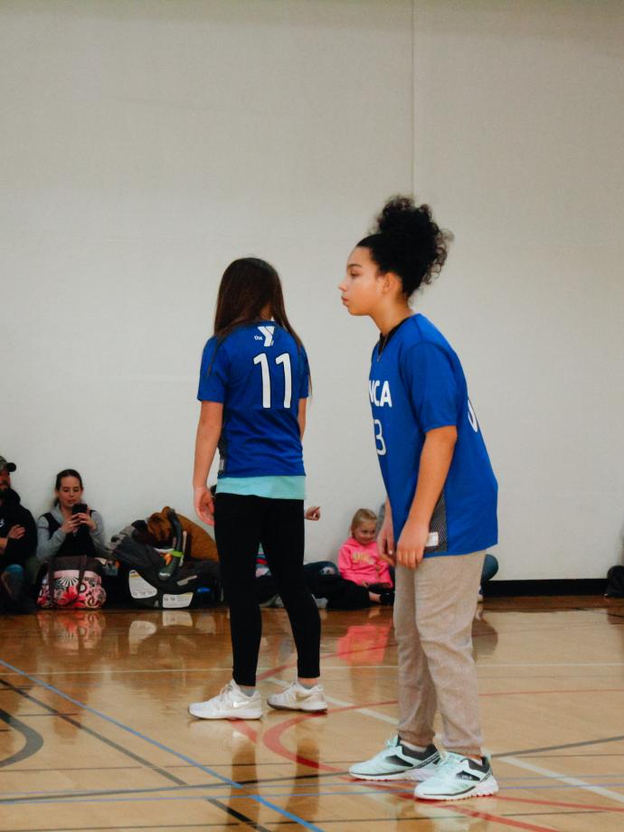 Volleyball player focused on the opposing serve at the YMCA