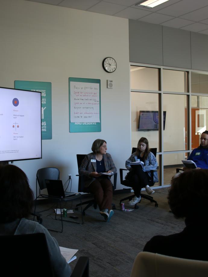 Bridge of hope participants engage in guided dialogue at the YMCA.