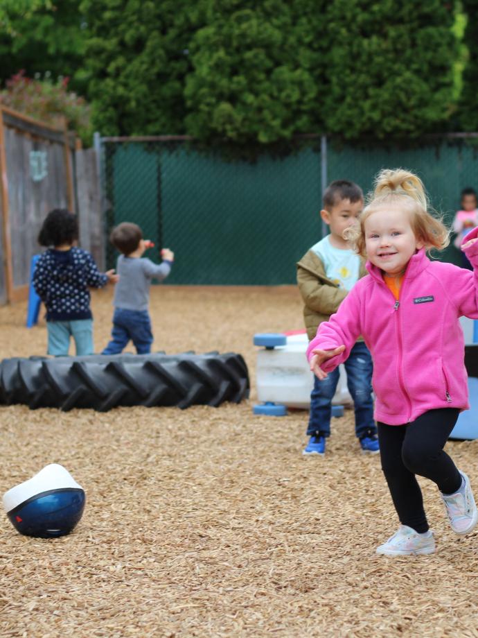 ELC students play in the playground at the YMCA early learning center.