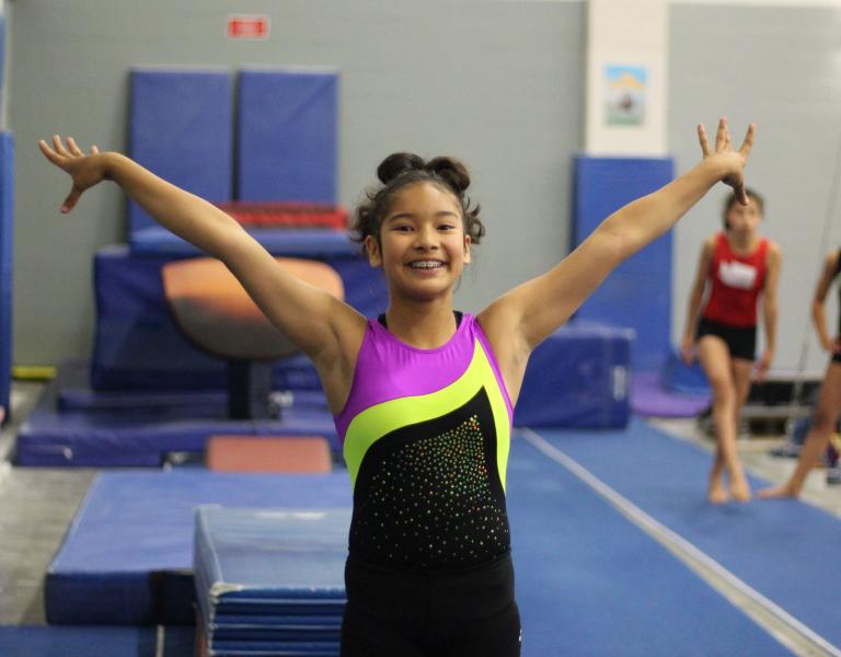 Smile and Pose in YMCA Gymnastics Class