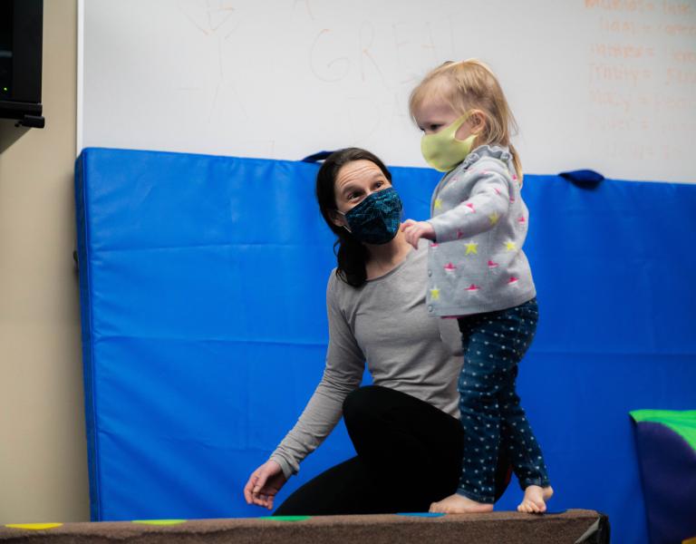 ymca-toddler-gym-balancing-with-parent.jpg