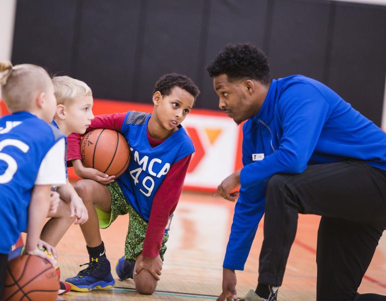 Practice Huddle at YMCA Youth Basketball League