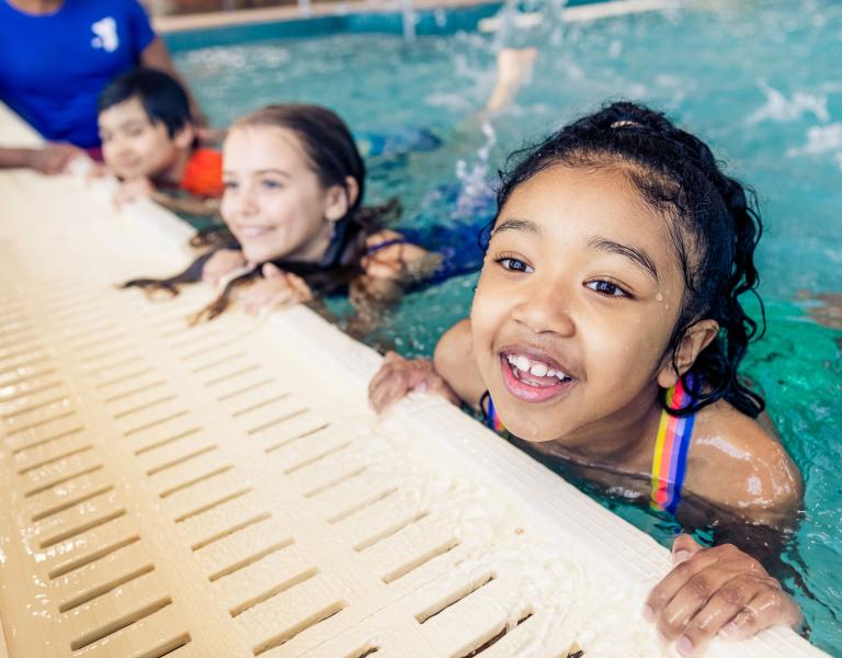 Kids at Edge of Pool at YMCA Swim Lessons